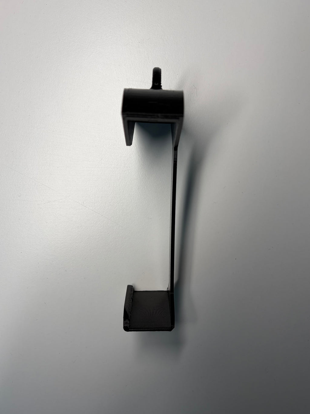 Black protective and transport case for SAUMI the drinking timer side view